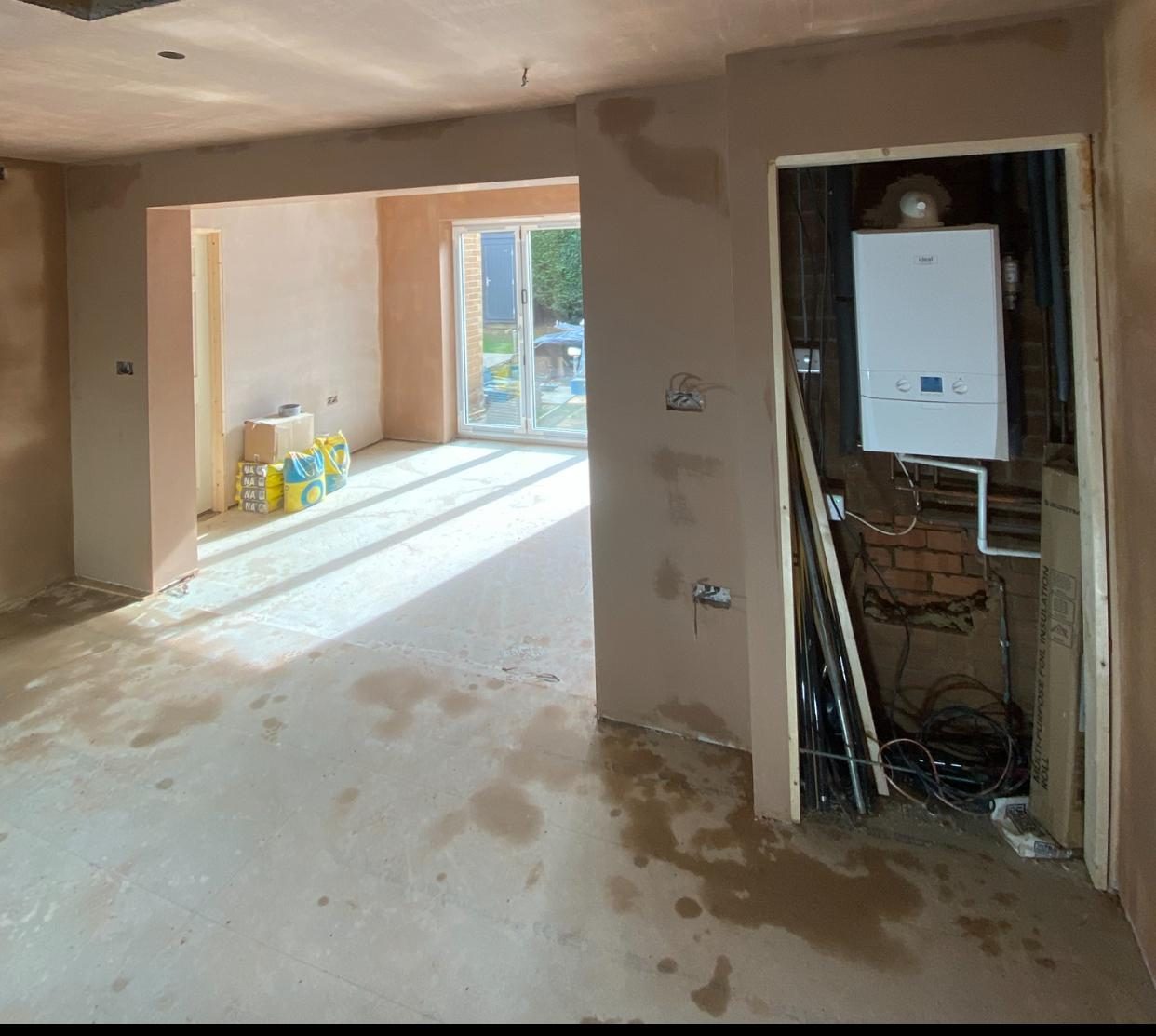Newly plastered kitchen area with fresh skim finish